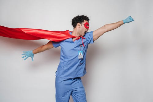 A male nurse dressed as a super hero